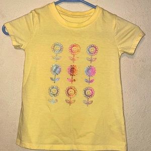 Between sunflower shirt